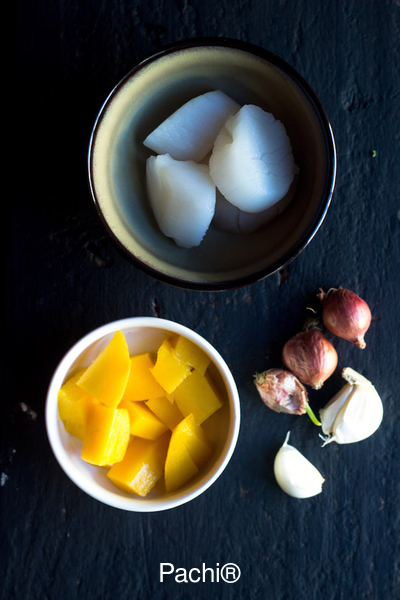 Vieiras en Salsa de Hierbas y Mango